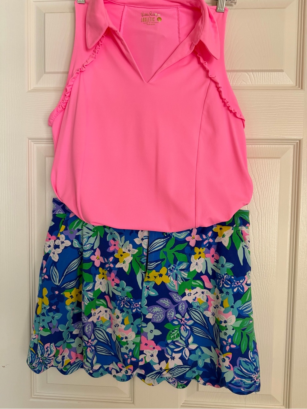 Lilly Pulitzer Pink top with Blue and Teal Floral Accent skort golf outfit